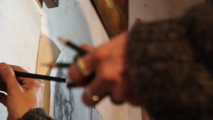 Artist draws a portrait  with a pencil - 4k video | Shutterstock HD Video #33844975