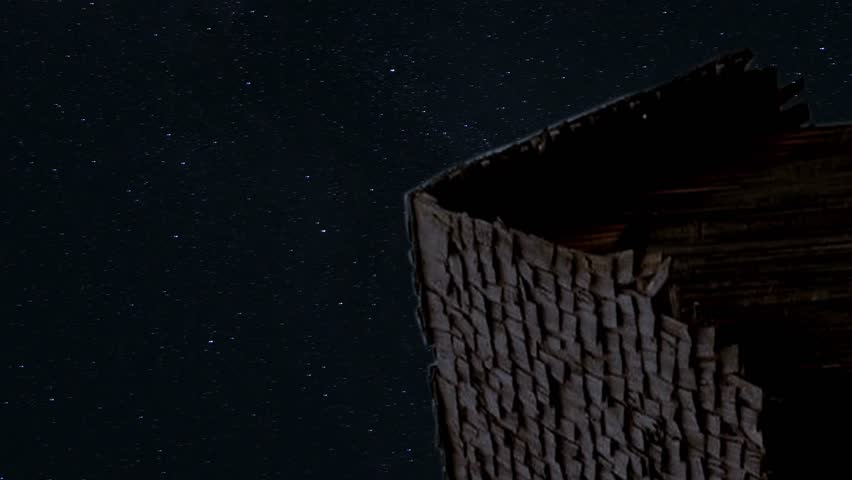 Stars moving night sky over village house time lapse star lapse and star trail with old village house in front vertical video