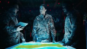 Futuristic Warfare Strategy: Military Intelligence Experts use Holographic Augmented Reality Table Map to Scan Enemy Terrain. Army Recoinessance Use 3D Surveillance Tech, Big Data Analysis to Win War - Powered by Shutterstock - Get 15% off with code: PIKWIZARD15