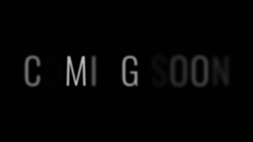 Animated coming soon with random blur text effect in black and white background