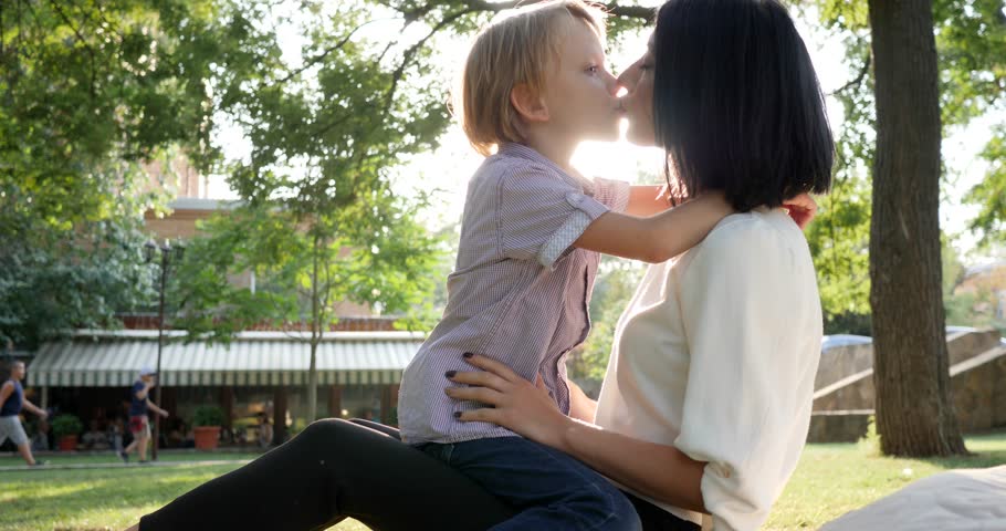 Young Mom Kisses Son In Stock Footage Video 100 Royaltyfree