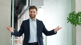 Confident happy business man invites you to join the team near the entrance to the modern business office. An employer, HR entrepreneur, an investor calls to invest or hire look at the camera. Join Us - Powered by Shutterstock - Get 15% off with code: PIKWIZARD15