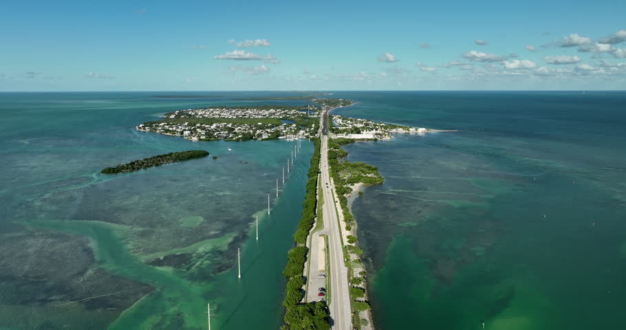 Flying backwards above Florida Overseas highway near Islamorada on Florida Keys