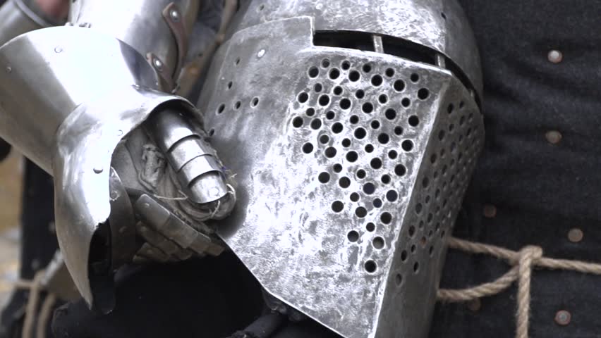 Knights carry a helmet in his hand Royalty-Free Stock Footage #33899986