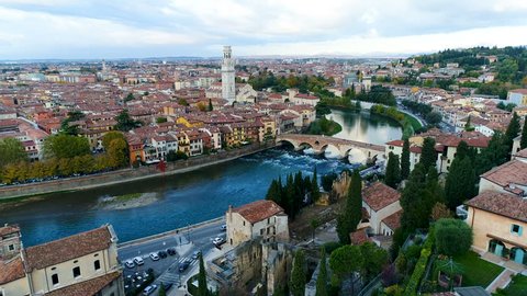 Ponte Pietra and Duomo di Verona (Cattedrale di Santa Maria Matricolare) Skyline Verona Aerial video from Sky, Italy, Video in 4K.