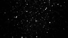 Silver glitter flying after being exploded, bright sparkles bouncing against camera flying and falling down on black background. Top view close up macro slow motion
 - Powered by Shutterstock - Get 15% off with code: PIKWIZARD15