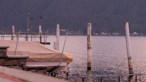 Lugano Lake. Bissone, tiny village on the lake. Cold winter sunset