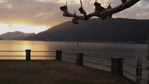 Lugano Lake. Backlight Sunset on the lake