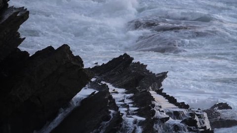 Waves crashing on the Rocks. Pure power, exhibition of nature forces. Pure energy. Ocean power against earth. This is how Erosion occurs .Waves crashing on the Rocks. Pure power, exhibition of nature 