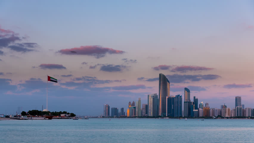 Abu Dhabi, UAE-Dec, 1 2023: Time Lapse of sunset overlook Abu Dhabi city scape in Corniche , Marina. Royalty-Free Stock Footage #3390691107