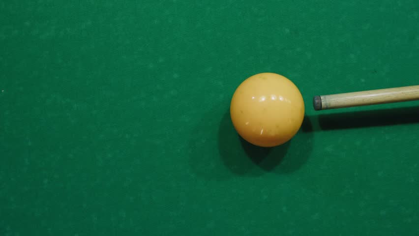 Playing billiard game. White pool balls close-up on green billiards table for start to play. Russian game, Russian pyramid. Billiard balls with numbers on a pool table. Billiards team sport. | Shutterstock HD Video #3390695979
