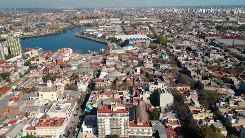 Aerial view of Caminito a famous landmark in La Boca neighborhood in Buenos Aires, Argentina. Drone flying forward
 Royalty-Free Stock Footage #3390778329