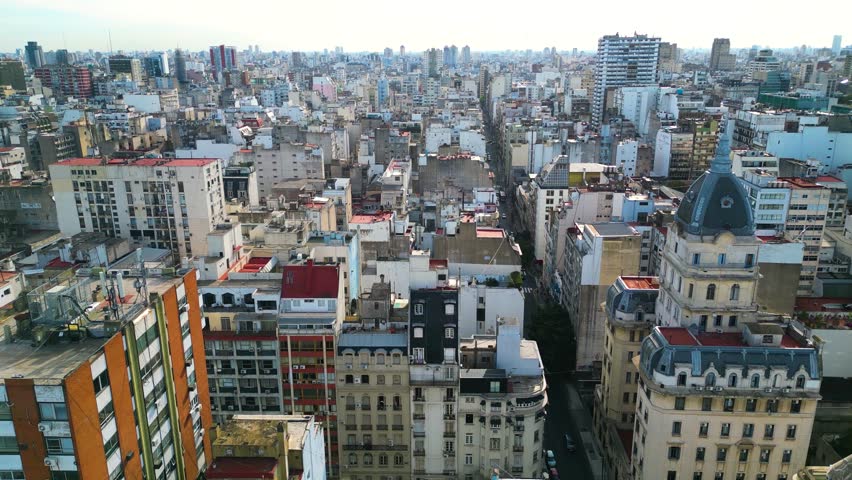 Aerial Drone Scene of Montserrat Neighborhood in Buenos Aires City, Argentina. Camera Moves Forward to Reveal City Skyline.
