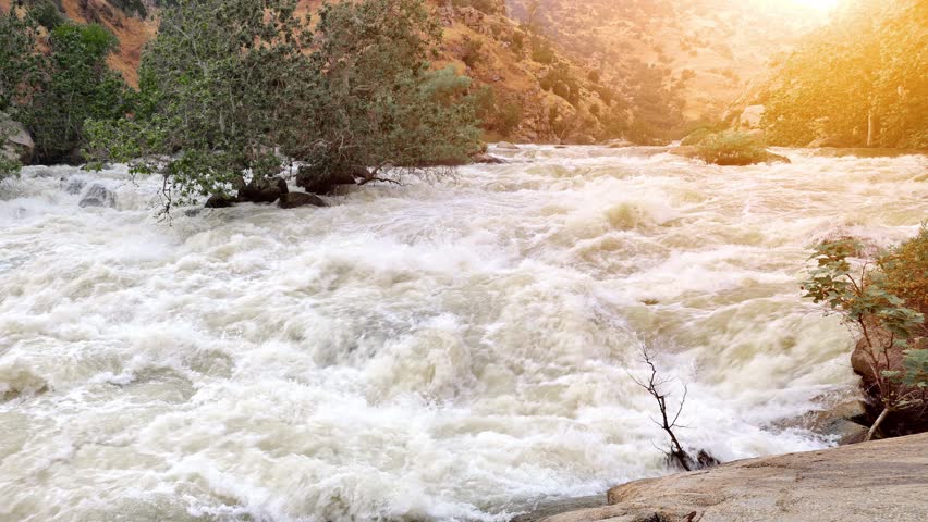 Panning shot of the river rapids on the Kern River in the Southern Sierra Nevada Mountains in California