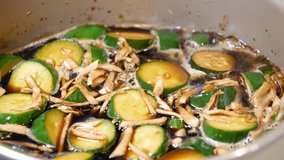 Pickled cucumbers. A video of ginger and cucumber simmered in soy sauce.