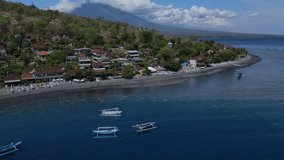 Indonesia, Bali, Amed, Aerial view of Amed beach and volcano Agung. High quality 4k footage