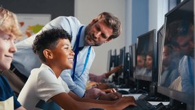Male teacher helping multi-cultural group of secondary or high school students at computers in IT class with male teacher - shot in slow motion - Powered by Shutterstock - Get 15% off with code: PIKWIZARD15