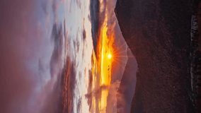 Magic light of sunrise in autumn mountains nature Vertical Time lapse