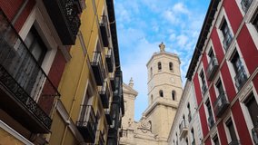 City center of Valladolid with beautiful architecture style and colourful buildings. Cathedral tower in background. High quality 4k footage