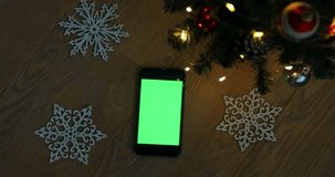Christmas green screen chroma key christmas shopping online top view smartphone