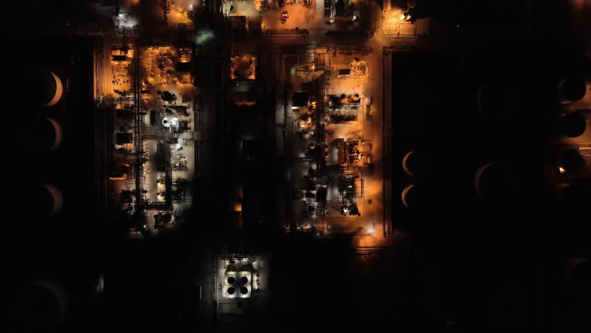 Oil Refinery - Petroleum Refinery At Night In Los Angeles, California, USA. - aerial ovehead shot