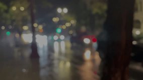 Multicolored lights of the evening city and passing cars. Abstract shot of evening city traffic bokeh. Rainy depressive weather. - Powered by Shutterstock - Get 15% off with code: PIKWIZARD15