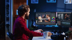 Portrait of happy video editor merging raw clips and footage into high quality finished videos in production studio. Videographer using specialized software application and editing tools