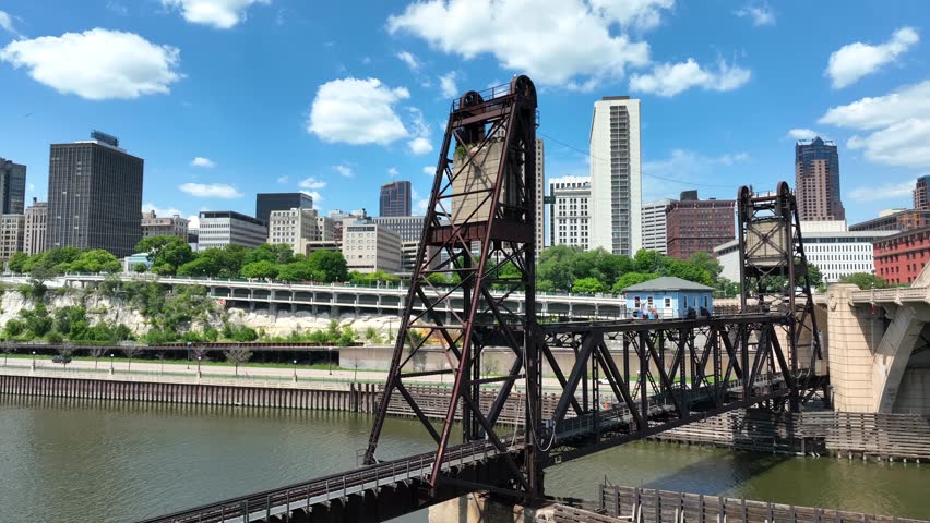 Railroad bridge in downtown Saint Paul, Minnesota. Aerial shot of skyline on beautiful day.