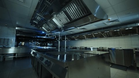 Professional industrial empty kitchen at the restaurant or cafe. Camera moving inside interior of big clean modern kitchen. : vidéo de stock