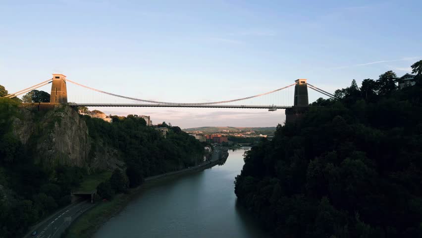 Aerial rising reveal of Clifton Suspension bridge designed by Isambard Brunel in 1864 near Bristol, England, UK