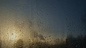 Condensation on winter window appearing due to changes in temperatures. High humidity on non-energy efficient glass. - Powered by Shutterstock - Get 15% off with code: PIKWIZARD15