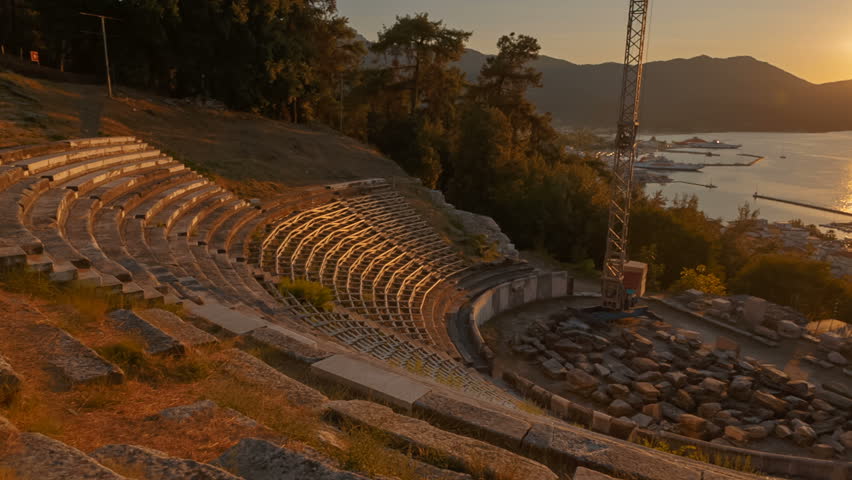 Wide angle establishing shot of the Ancient Theater in Limenas Thassos, Greece in the North Aegean Sea, the northernmost Greek island