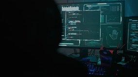 Hacker silhouette with short haircut watches server decoding process on computer monitors. Obtaining data in illegal way. Experienced female programmer - Powered by Shutterstock - Get 15% off with code: PIKWIZARD15