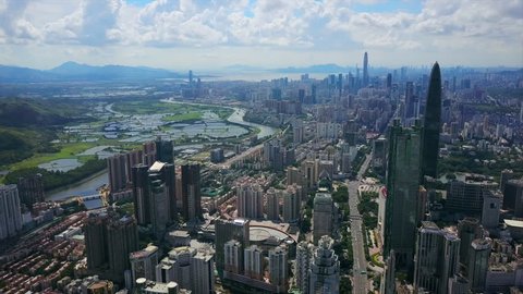 shenzhen cityscape sunny day hong kong border river aerial panorama 4k china