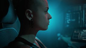 Concentrated young woman hacker observes server deciphering process on computer monitors. Acquiring data through illicit means. Decoding and encoding specialist - Powered by Shutterstock - Get 15% off with code: PIKWIZARD15