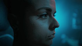 Face of focused woman hacker decrypting file to identify illegal information in dark premise. Obtaining data through hacker fraud. Attack on software slow motion - Powered by Shutterstock - Get 15% off with code: PIKWIZARD15