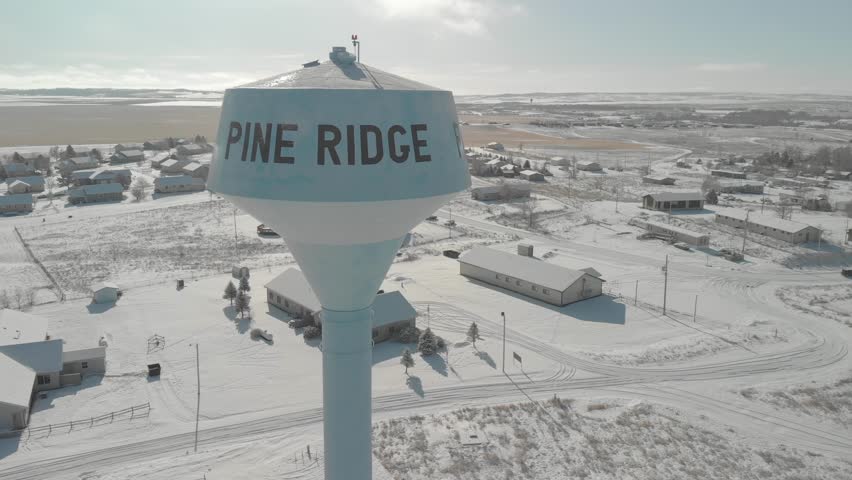 Aerial View of Pine Ridge Water Tower Overlooking Snow-Covered Reservation