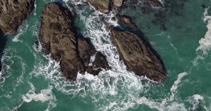 4K Drone Footage Zooming in Close up of Pacific Ocean Waves in Brookings Oregon
