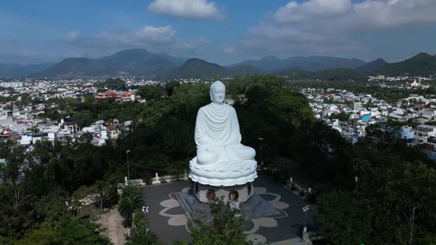 White Big Buddha Vietnam is the one landmarks on Nha Trang Vietnam. Aerial top view on a sunny day over Big Buddha of Vietnam. Big Buddha white statue