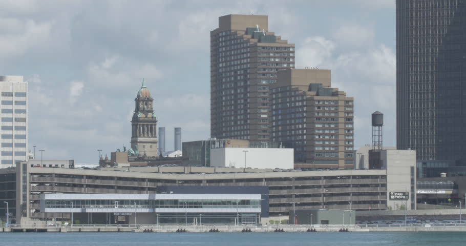 Beautiful sunny day of the downtown skyline and towering buildings in Detroit, Michigan.