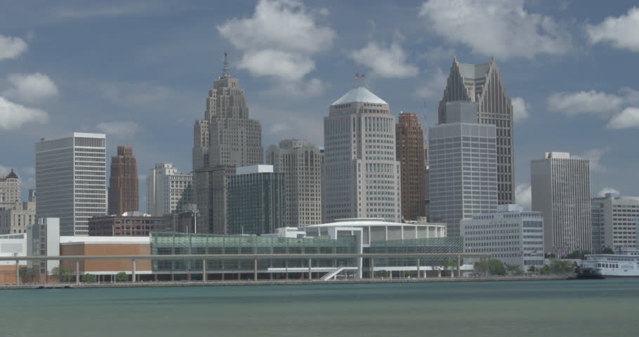Beautiful sunny day of the downtown skyline and towering buildings in Detroit, Michigan.