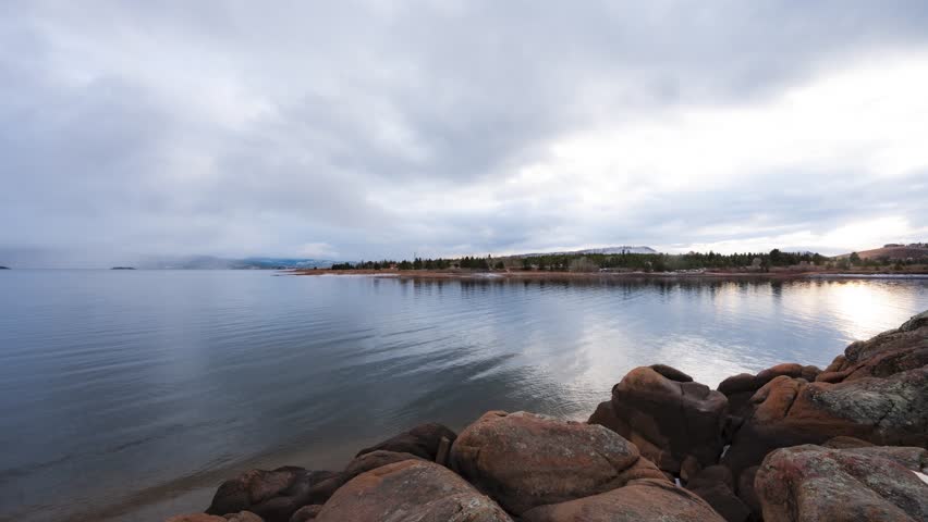 Timelapse of Shadow Mountain Lake in Grand Lake Colorado with smooth water and clouds moving