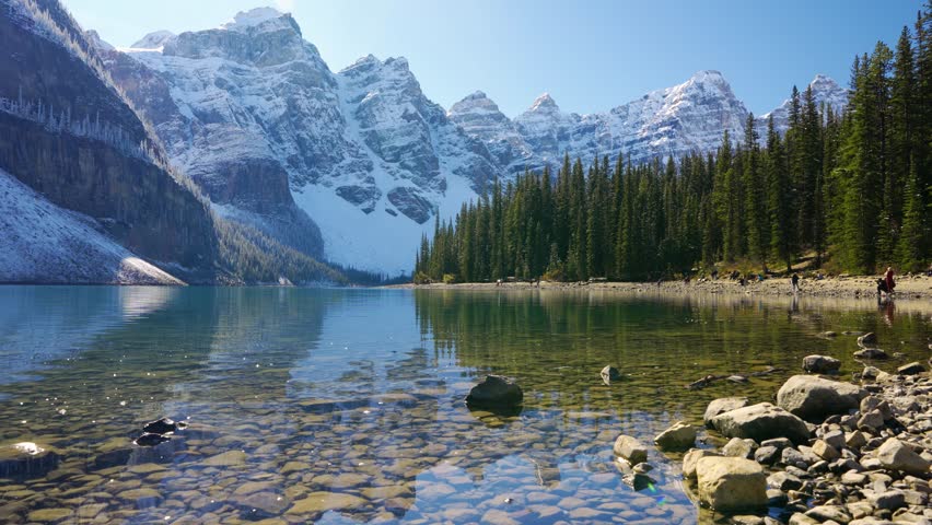Moraine lake in autumn sunny day morning. Snow-capped Valley of the Ten Peaks reflection on the lake. Banff National Park, Canadian Rockies. Alberta, Canada.