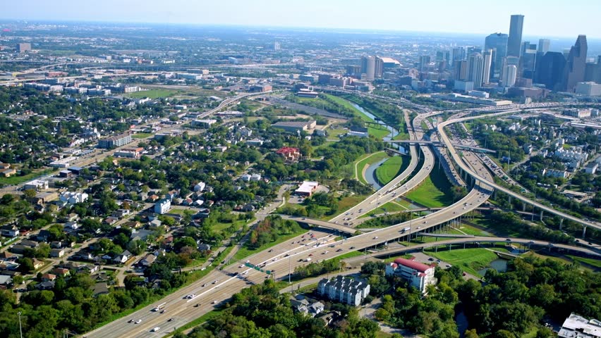 Aerial view of the freeways converging near downtown Houston, Texas shot via helicopter from an altitude of about 700 feet.