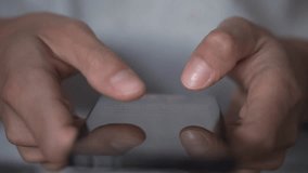 Business in hand. Successful businessman reviewing financial data and doing strategic planning using his smartphone A modern workplace. Scrolling news feeds - Powered by Shutterstock - Get 15% off with code: PIKWIZARD15