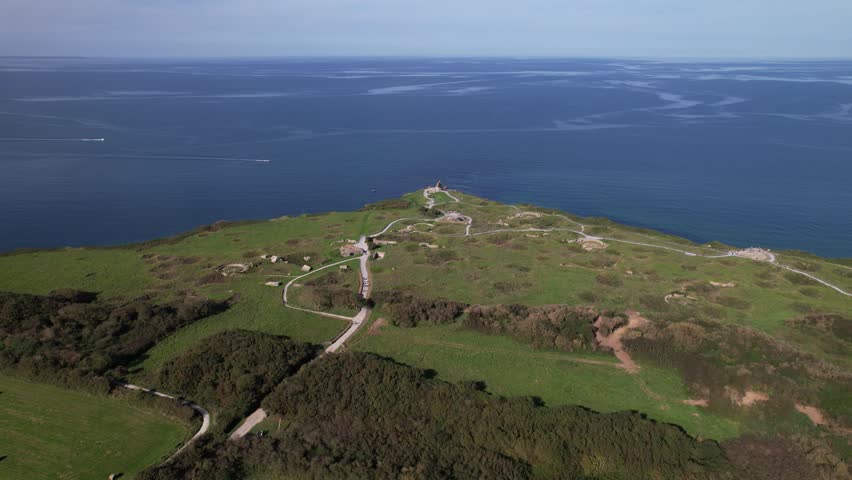 DRONE AERIAL FOOTAGE: The World War II Pointe du Hoc Ranger Monument. Pointe du Hoc is a high point between two of the five D-Day landing beaches, Utah and Omaha in Normandy, France.