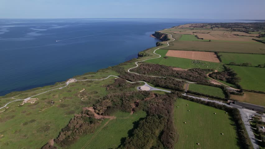 DRONE AERIAL FOOTAGE: The World War II Pointe du Hoc Ranger Monument. Pointe du Hoc is a high point between two of the five D-Day landing beaches, Utah and Omaha in Normandy, France.