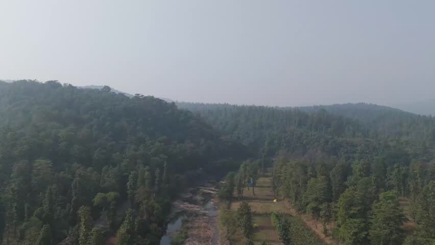 Aerial view of mountain teak tree forest and dry river. Aerial View of beautiful forest of Dang Gujarat-India.