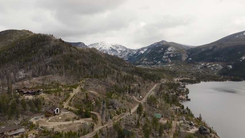 Drone of Ptarmigan Mountain from Grand Lake Colorado with a snowstorm approaching over peak