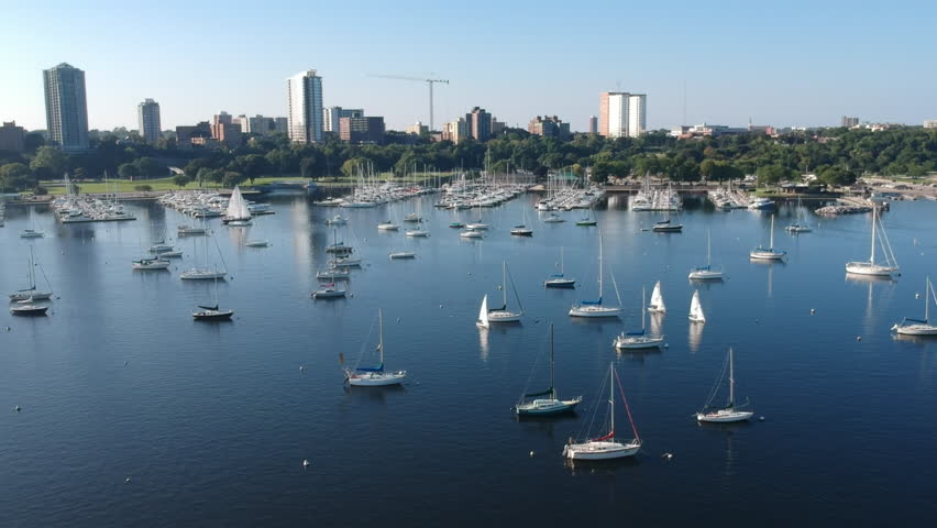 Drone shot of sail boats in Lake Michigan bay in downtown Milwaukee Wisconsin